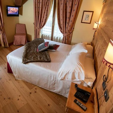 Laghetto Alpine Hotel & Restaurant Брюссон Экстерьер фото