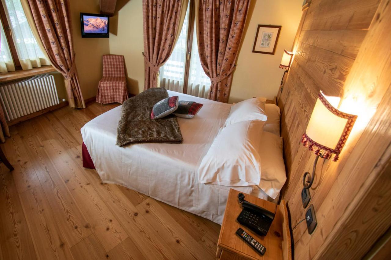 Laghetto Alpine Hotel & Restaurant Брюссон Экстерьер фото